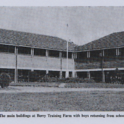 The main buildings at Berry Training Farm with boys returning from school