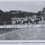 Clairvaux boys on their way to a game of football. The playing fields below are part of the Clairvaux grounds