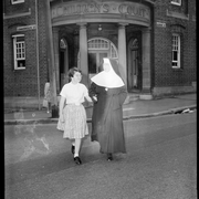 Nun from the order of Sister of the Good Shepherd escorting a girl, Children's Court Albion Street, Sydney, 25 October, 1963